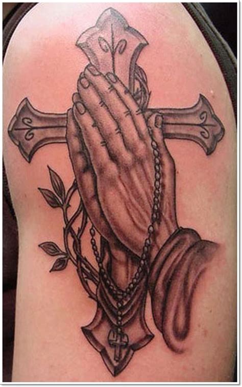 cross with praying hands tattoo designs|praying hands tattoo on chest.